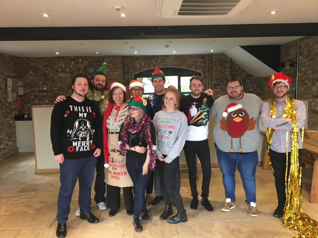Summit retail experts looking festive in Christmas jumpers